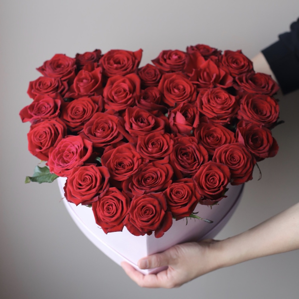 Red roses in a heart-shape box