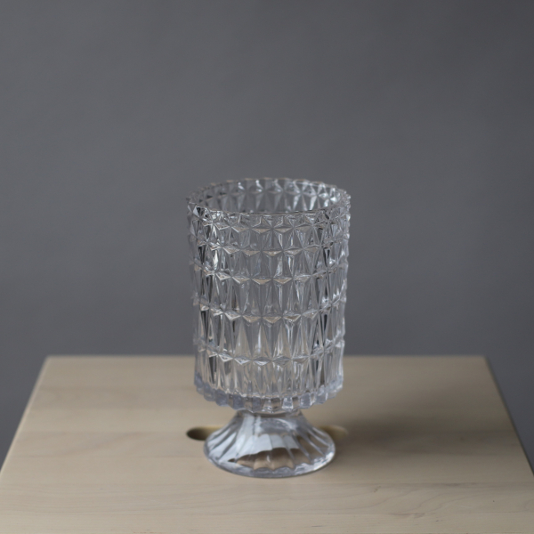 Ribbed vase with a leg